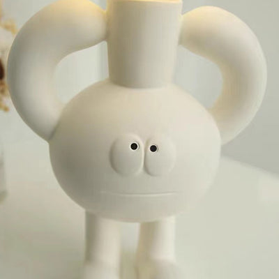 Moderne nordische Harzglaskugel Cartoon Charakter 1-flammige Tischlampe für das Bett 