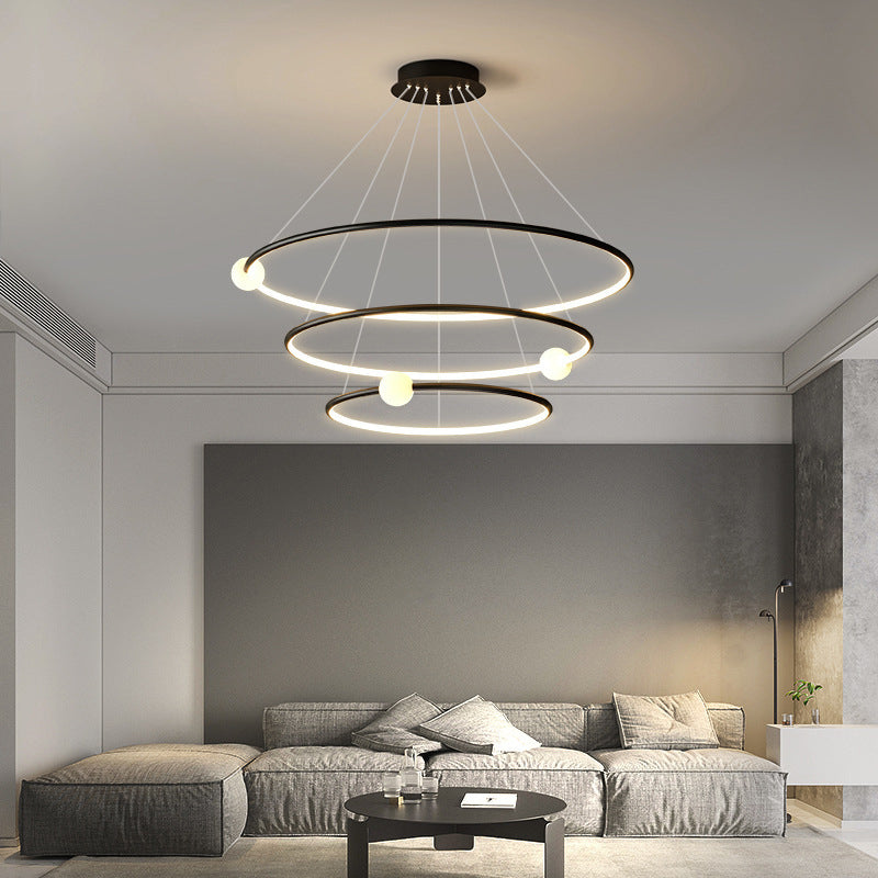 Moderner minimalistischer mehrstufiger Kreis aus Aluminium, Eisen und Silikon, LED-Kronleuchter für Wohnzimmer 