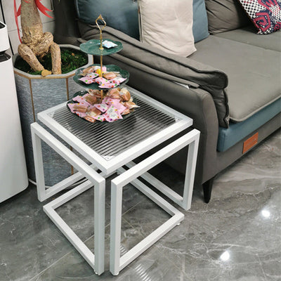 Table d'appoint carrée en verre et fer à la simplicité contemporaine pour salon 