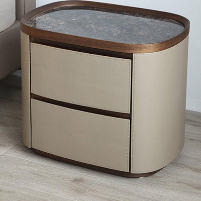 Moderner minimalistischer elliptischer Schiefer-Sattel-Leder-Walnuss-Samt-Nachttisch mit 2 Schubladen für das Bett 