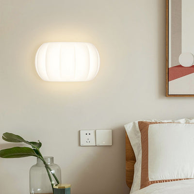 Applique murale LED elliptique en forme de citrouille en fer et acrylique de simplicité moderne pour chevet 