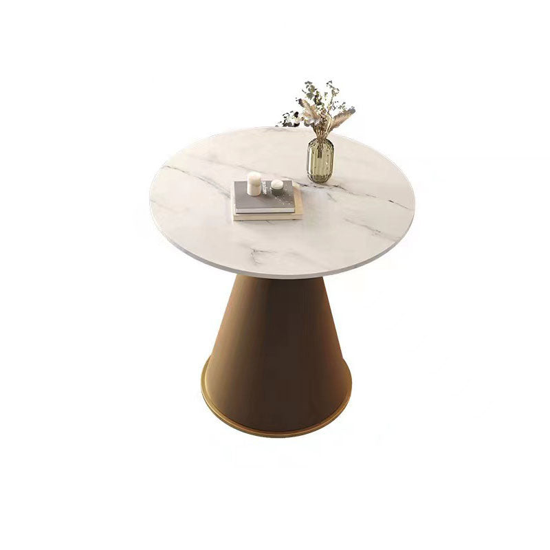 Table basse contemporaine de luxe avec plateau rond en pierre frittée et base en métal pour salon 