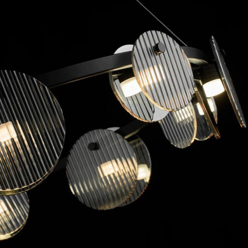 Lámpara de araña LED moderna minimalista de aros de hierro, vidrio y acrílico para salón 