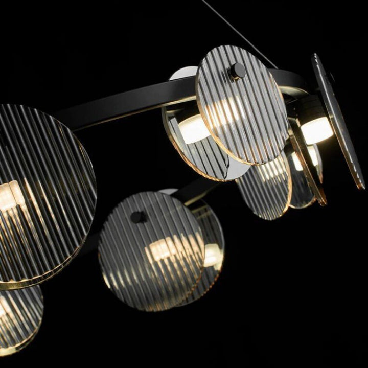 Lámpara de araña LED moderna minimalista de aros de hierro, vidrio y acrílico para salón 