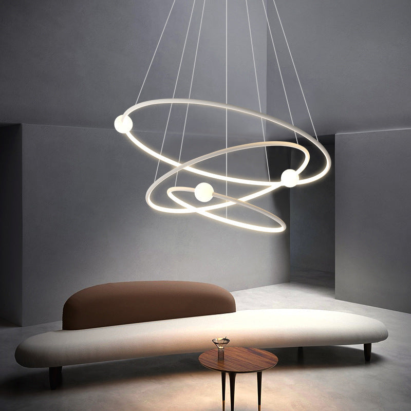 Moderner minimalistischer mehrstufiger Kreis aus Aluminium, Eisen und Silikon, LED-Kronleuchter für Wohnzimmer 