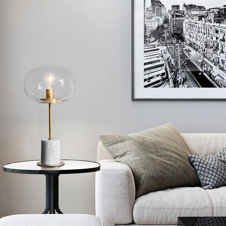 Lampe de table moderne minimaliste à une lumière avec base en marbre cylindrique et boule ronde en fer et verre pour salon 