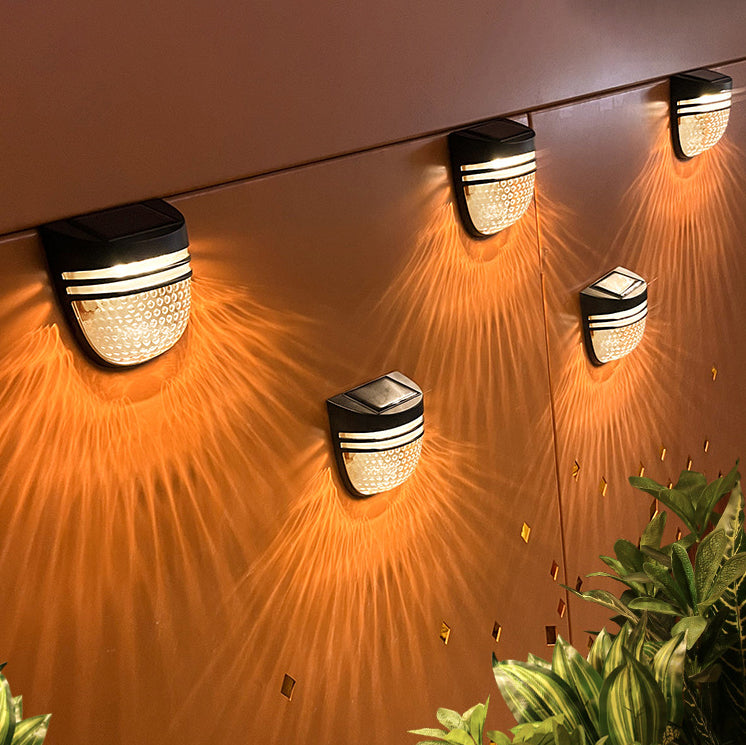 مصباح حائط LED عصري بسيط مقاوم للماء يعمل بالطاقة الشمسية مصنوع من ABS وPC بتصميم خلية نحل بيضاوي للاستخدام في الفناء الخارجي 