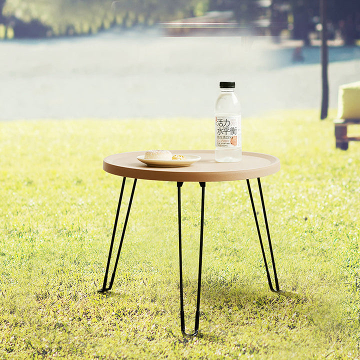 Table basse moderne minimaliste ronde en acier au carbone PP pliable pour salon 