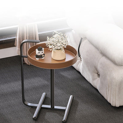 Table d'appoint ronde moderne minimaliste en cuir et acier inoxydable pour salon 