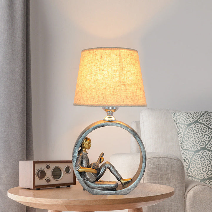 Lampe de table contemporaine créative ronde fille garçon en résine avec tissu 1 lumière pour salon 