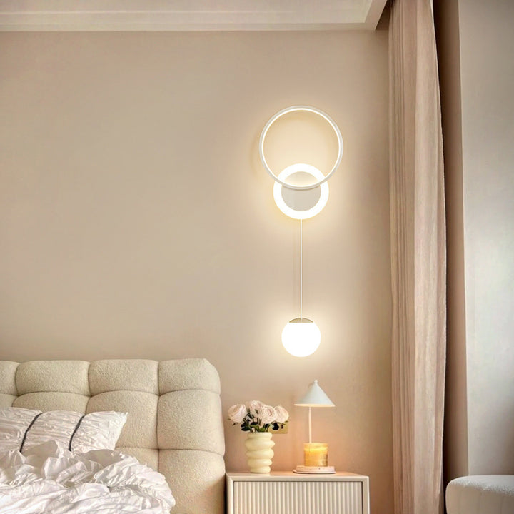 Applique murale LED en fer et acrylique à boule ronde de simplicité moderne pour chevet 