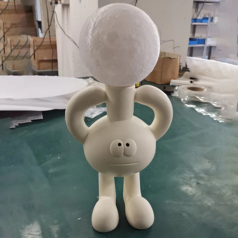 Moderne nordische Harzglaskugel Cartoon Charakter 1-flammige Tischlampe für das Bett 
