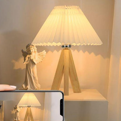 Lámpara de mesa de 1 luz con pantalla de tela plisada trapezoidal minimalista moderna y trípode de madera para dormitorio 