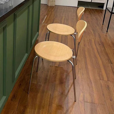 Chaise de salle à manger contemporaine en bois nordique en acier inoxydable avec dossier rond pour salle à manger 