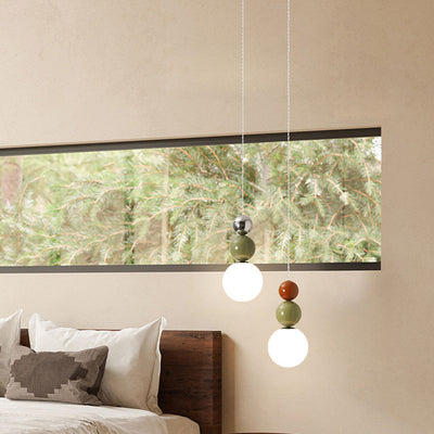 Moderne minimalistische runde Kugel Eisen Glas 1-Licht Pendelleuchte für Schlafzimmer 