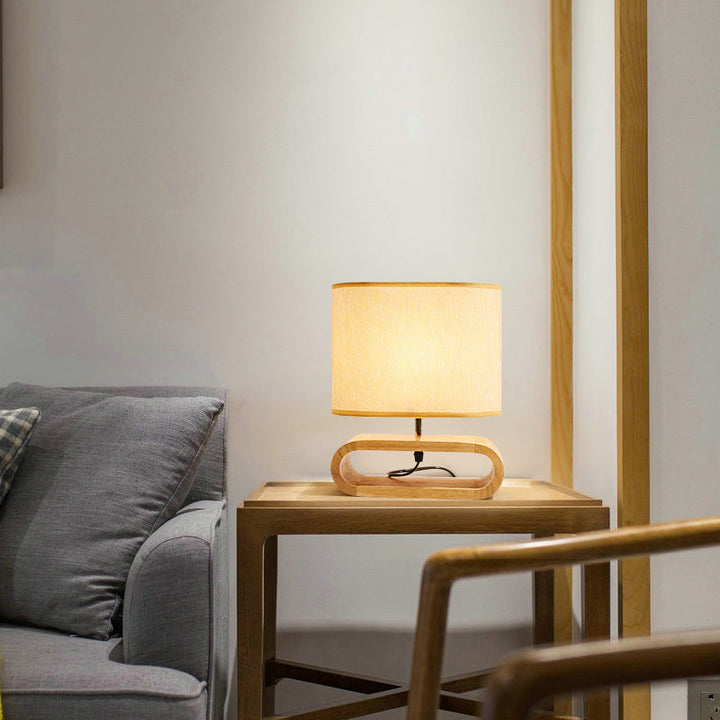 Lámpara de mesa contemporánea nórdica de cilindro de tela de madera elíptica de 1 luz para estudio 