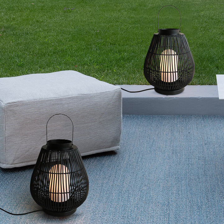 Moderner Outdoor-Rattan-gewebter, käfigförmiger 1-Licht-Außenlandschaftslicht 