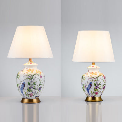Lampe de table 1 lumière en céramique ovale ronde chinoise traditionnelle avec motif de fleurs et d'oiseaux en tissu et fer pour chambre à coucher 