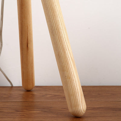 Lámpara de mesa de una luz con base de madera de tres patas redonda y simple japonesa de tela 