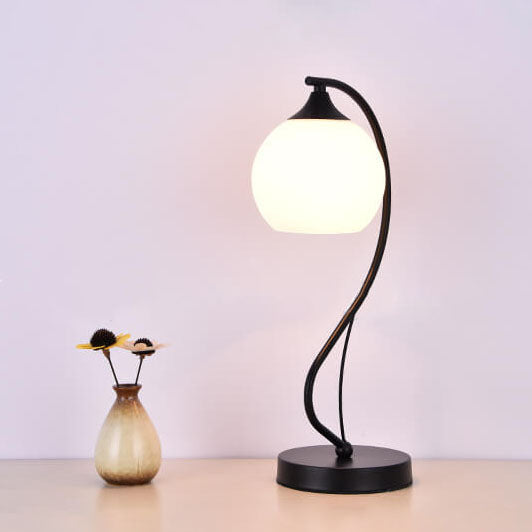 Moderne einfache Blumen-Glaslampe mit gebogenem Eisenfuß, 1-Licht-Tischlampe 
