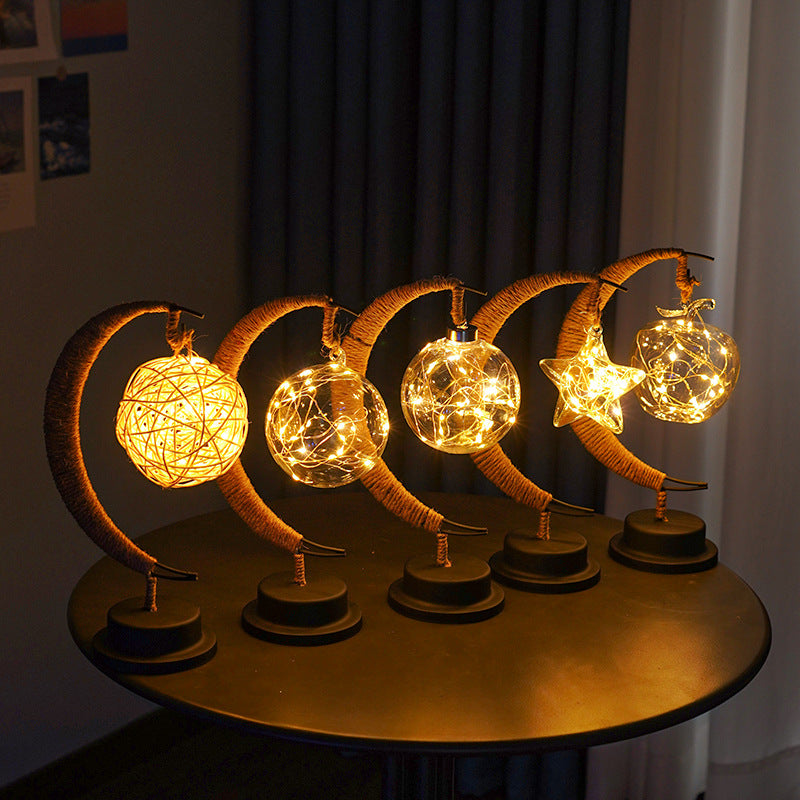Moderne dekorative Mondkugel Sterne Eisen Kunststoff Rattan Batterie USB Tischlampe 