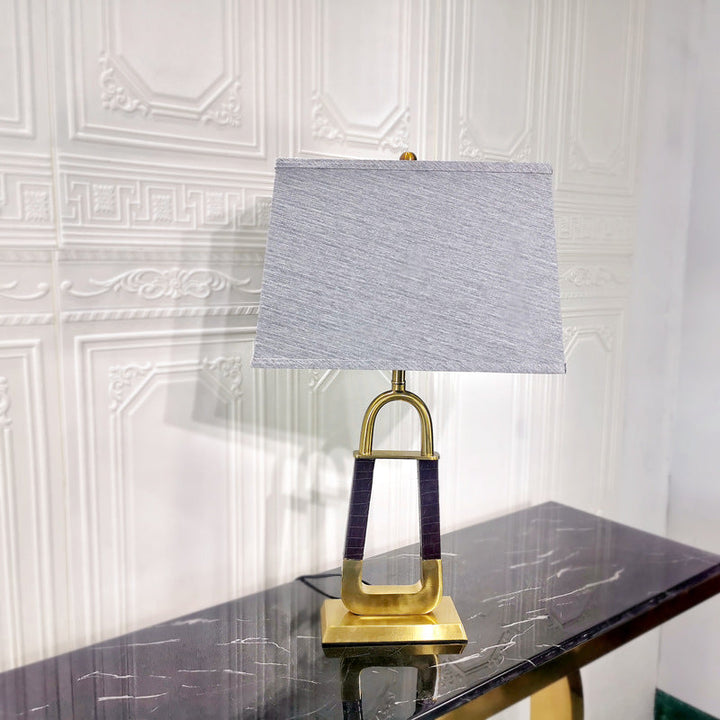 Lámpara de mesa moderna minimalista rectangular de metal y cuero con 1 luz para dormitorio 