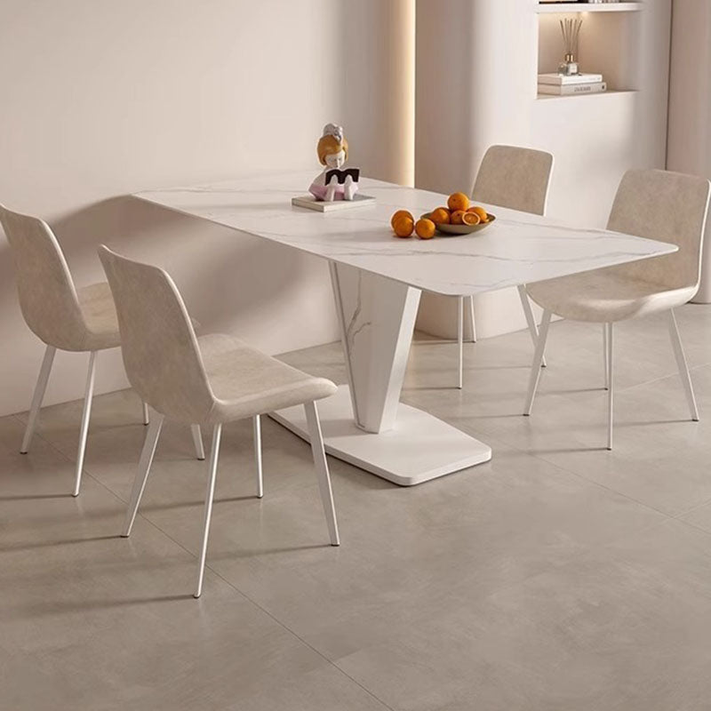 Chaise de salle à manger contemporaine en cuir scandinave en acier au carbone avec dossier carré incurvé en éponge pour salle à manger 