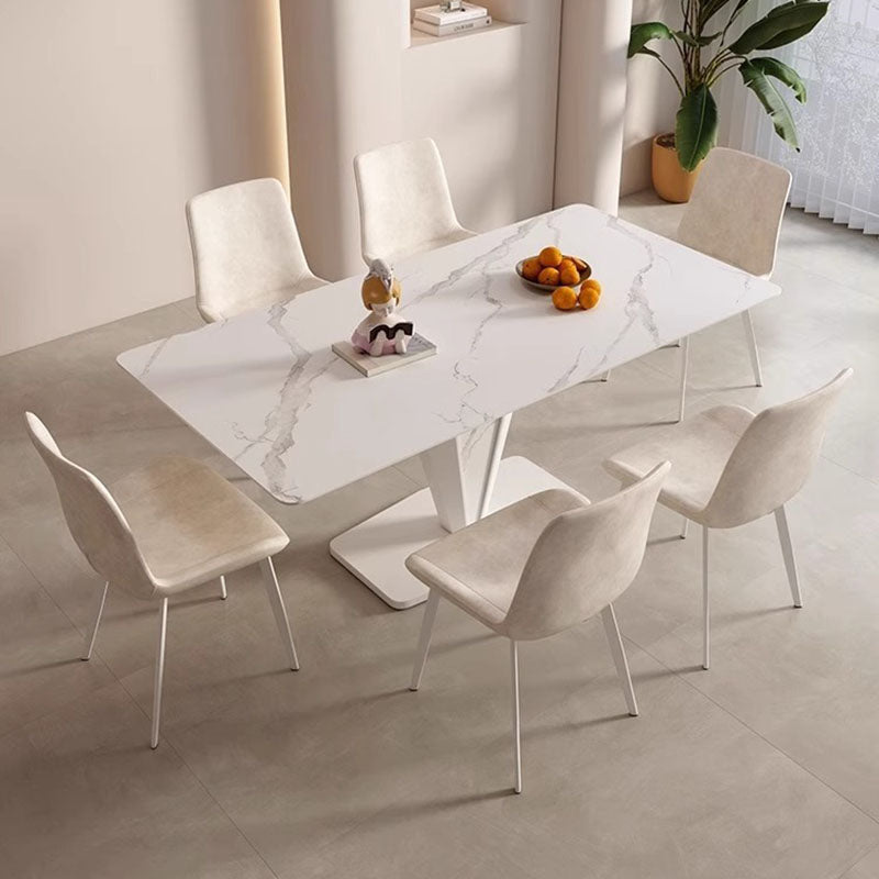 Chaise de salle à manger contemporaine en cuir scandinave en acier au carbone avec dossier carré incurvé en éponge pour salle à manger 