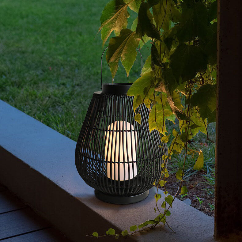 Moderner Outdoor-Rattan-gewebter, käfigförmiger 1-Licht-Außenlandschaftslicht 