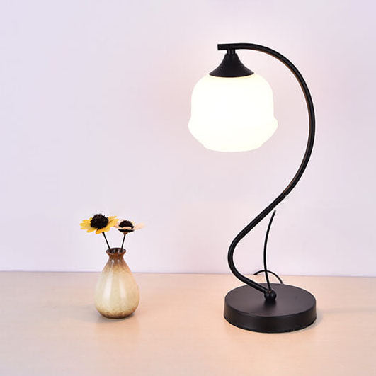 Moderne einfache Blumen-Glaslampe mit gebogenem Eisenfuß, 1-Licht-Tischlampe 