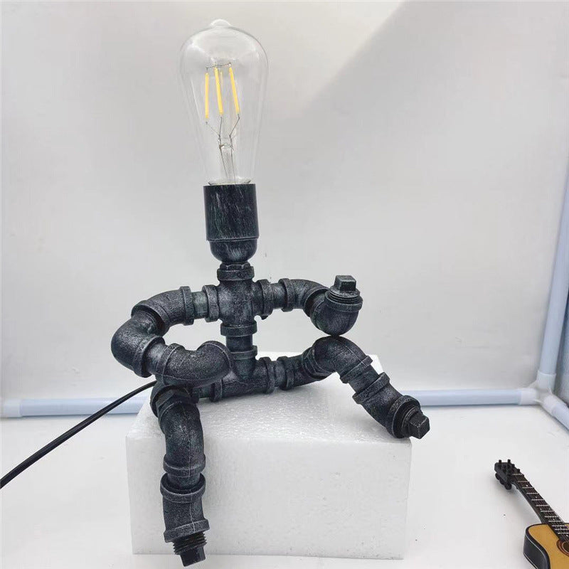 Lampe de table à 1 lumière au design robotique en tuyau d&