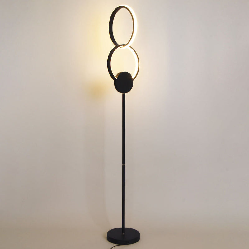 Lámpara de pie LED con base de hierro interconectada de anillos dobles de acrílico de simplicidad moderna 
