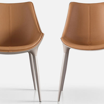 Chaise de salle à manger moderne en cuir de vache simplicité en acier éponge carrée avec dossier incurvé pour salle à manger 