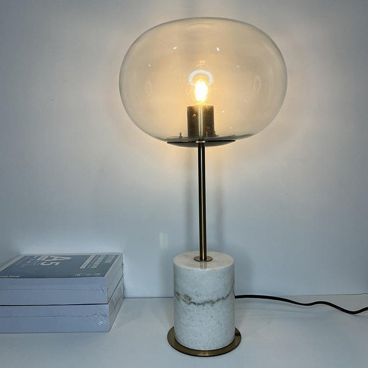 Lampe de table moderne minimaliste à une lumière avec base en marbre cylindrique et boule ronde en fer et verre pour salon 