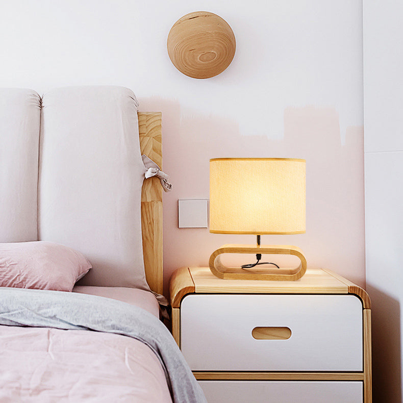 Lámpara de mesa contemporánea nórdica de cilindro de tela de madera elíptica de 1 luz para estudio 