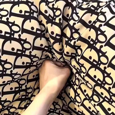 Fauteuil à bascule en velours pied-de-poule nordique contemporain avec dossier en acier au carbone pour salon 