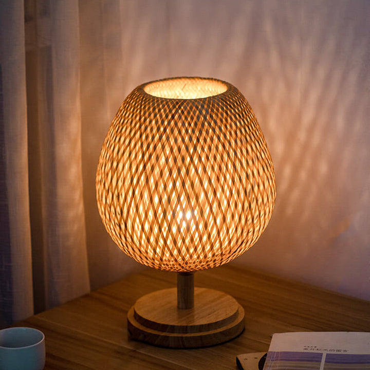 Traditional Chinese Moso Bamboo Wood Iron Weaving Oval Round 1-Light Table Lamp For Bedroom