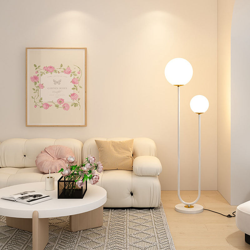 Moderner minimalistischer langer runder Ball Eisen Glas 2-Licht Stehlampe für Schlafzimmer 