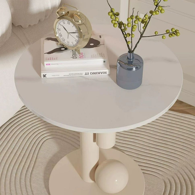 Zeitgenössischer kreativer runder Zylinder-Orb-Felsplatte-Kaffeetisch aus Kohlenstoffstahl für das Wohnzimmer 