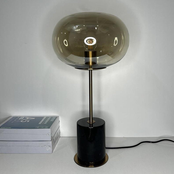 Lampe de table moderne minimaliste à une lumière avec base en marbre cylindrique et boule ronde en fer et verre pour salon 