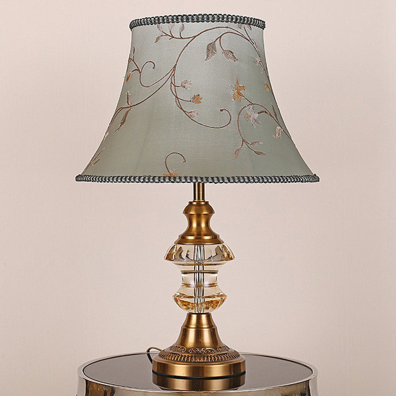 Traditionelle europäische Zylinder-Hardware-Kristallgewebe-1-Licht-Tischlampe für Schlafzimmer 
