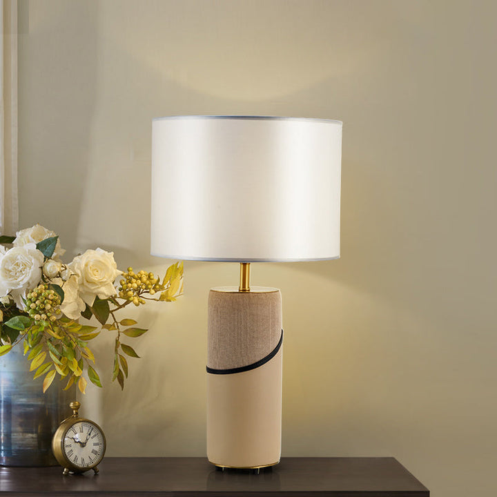 Moderne Übergangsstoff Schatten Leder Zylinder Basis 1-Licht Tischlampe für Schlafzimmer 