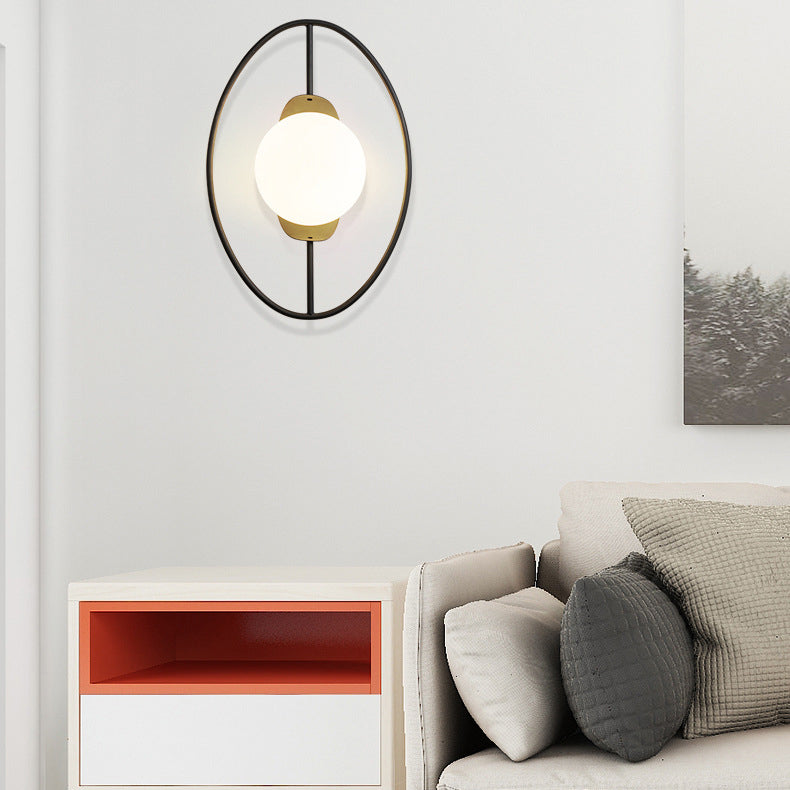 Applique murale contemporaine nordique en fer et verre ovale à 1 lumière pour chevet 