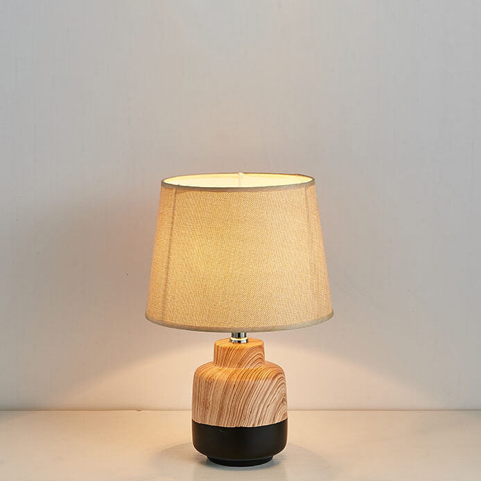 Moderne minimalistische Holzmaserung Stoff Keramik 1-Licht Tischlampe 