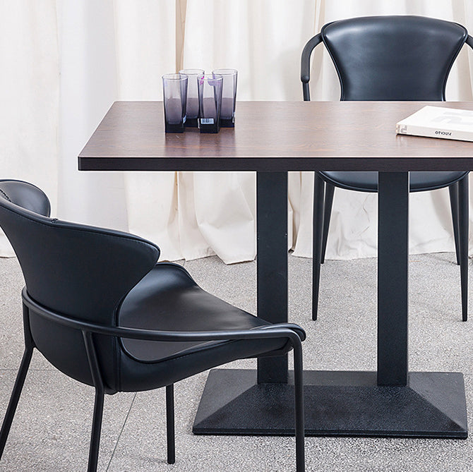Chaise de salle à manger en cuir et métal avec dossier trapézoïdal minimaliste moderne pour salle à manger 