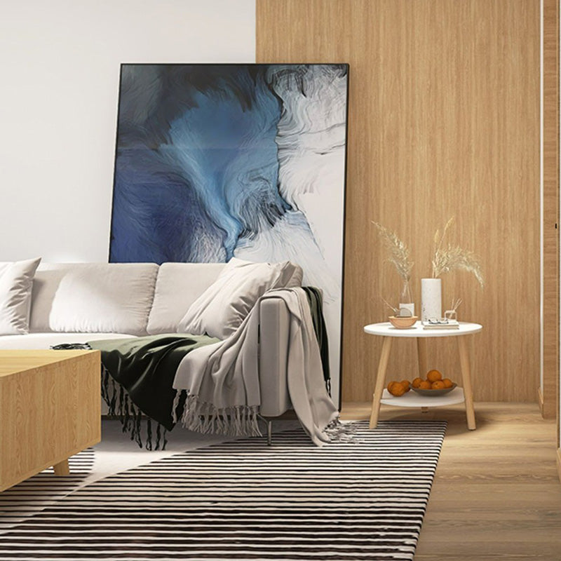 Table basse en bois moderne minimaliste avec plateau rond et base triangulaire à deux niveaux pour salon 