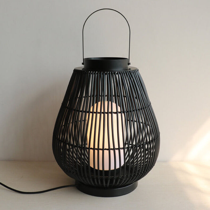 Moderner Outdoor-Rattan-gewebter, käfigförmiger 1-Licht-Außenlandschaftslicht 