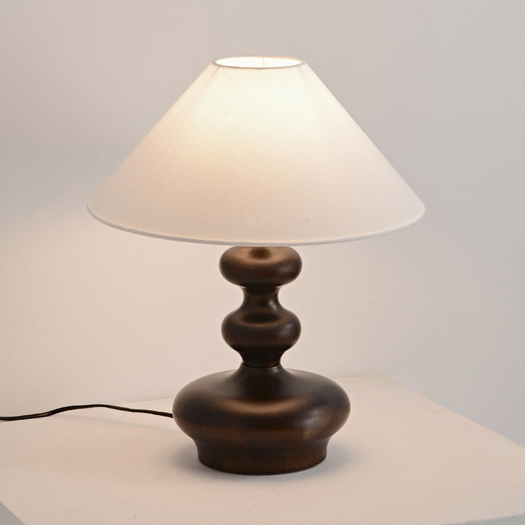 Lámpara de mesa contemporánea retro de madera de fresno y lino con pantalla trapezoidal redonda de 1 luz para dormitorio 