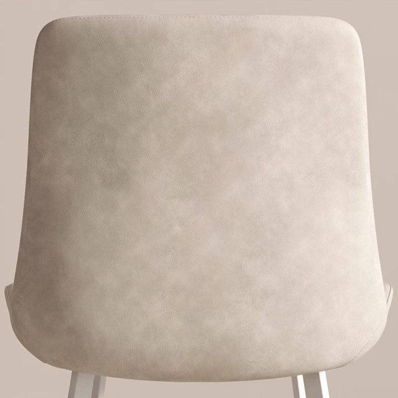 Chaise de salle à manger contemporaine en cuir scandinave en acier au carbone avec dossier carré incurvé en éponge pour salle à manger 