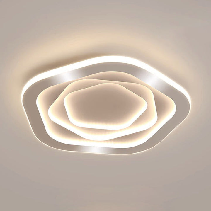 Plafonnier LED en forme de nuage avec fleur en fer rose de simplicité contemporaine pour salon 